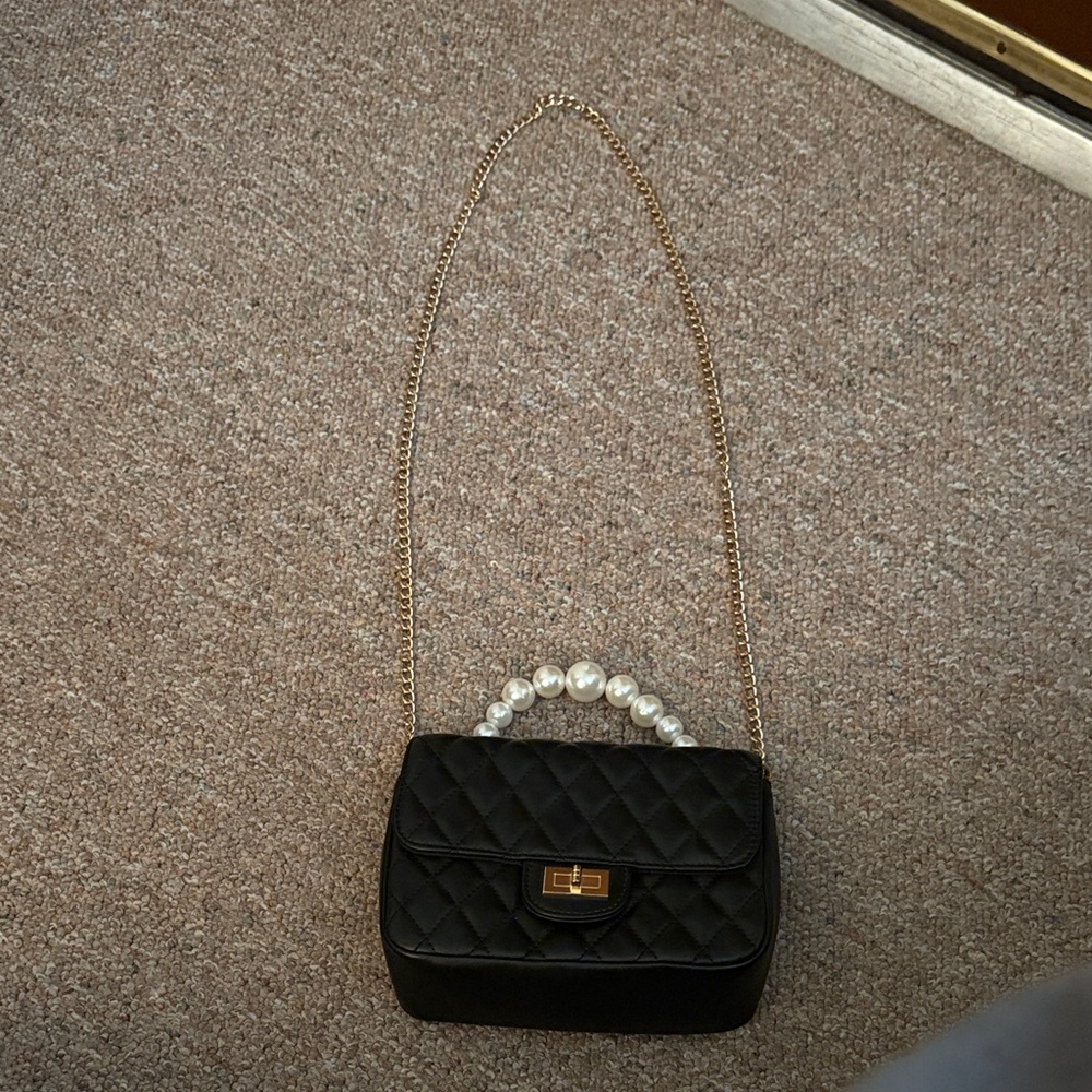 Elegant Black Quilted Handbag with Pearl Handle